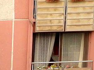 Neighbor woman shows tits on the balcony Picture 3
