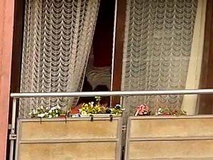 Neighbor woman shows tits on the balcony Picture 6