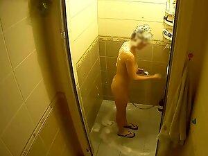 Spying on incredible busty girl naked in shower Picture 2