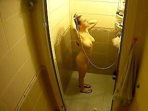 Spying on incredible busty girl naked in shower Picture 8