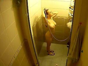 Spying on incredible busty girl naked in shower Picture 8