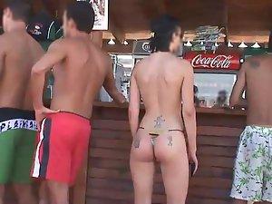 Tattooed ass followed on a beach party Picture 7