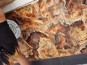 Checking out her butt cheek tattoo at the beach bar Picture 1