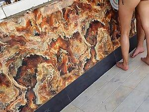 Checking out her butt cheek tattoo at the beach bar Picture 7