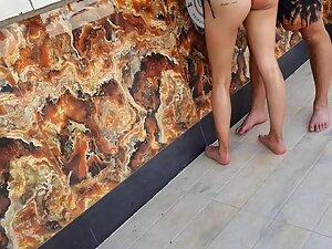 Checking out her butt cheek tattoo at the beach bar Picture 8