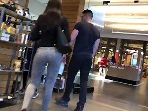 Inspecting a sporty girlfriend in the store Picture 1