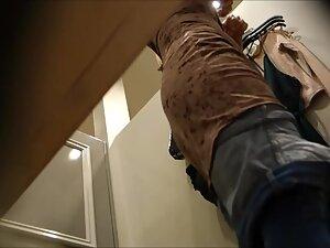 Voyeur peeps on her tramp stamp tattoo and big fake tits Picture 1