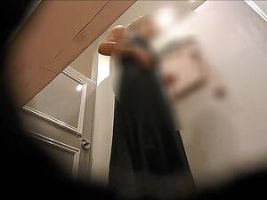 Voyeur peeps on her tramp stamp tattoo and big fake tits Picture 5