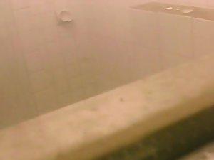 Women peeped as they chat in a shower Picture 6