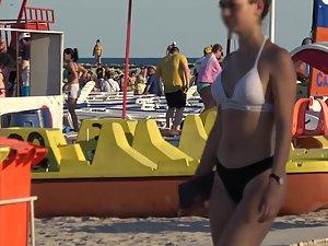 Sweet girl's anus slips out of bikini while she sunbathes Picture 6
