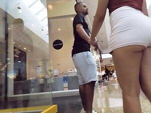 Bubble butt inspection while she holds hands with boyfriend Picture 3