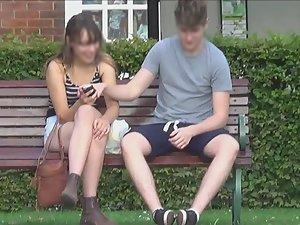 Hottie in shorts sits with crossed legs