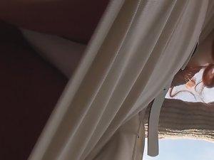 Voyeur tricks a hot girl to see upskirt Picture 7