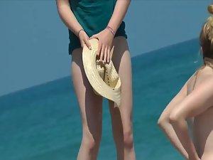Two sisters spied on a nudist beach Picture 7