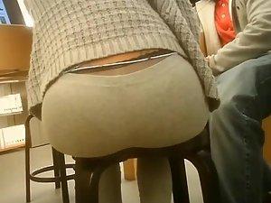 Half thong panty line on a round ass