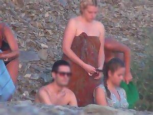 Nudist women starting to undress Picture 5