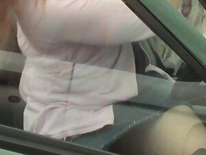 Pussy slip in upskirt when she sits in her car Picture 3