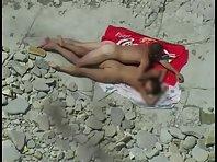 Couple making love at a beach Picture 4