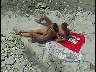 Couple making love at a beach Picture 5