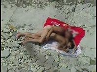 Couple making love at a beach Picture 6