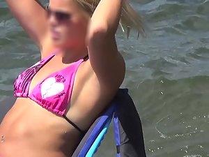 Hot girls on paddle boat notice the voyeur Picture 1