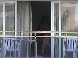 Peep on neighbor girl's tits on a balcony Picture 2