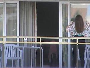 Peep on neighbor girl's tits on a balcony Picture 7