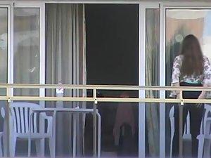 Peep on neighbor girl's tits on a balcony Picture 8