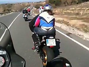Girl's thong visible on the motorcycle