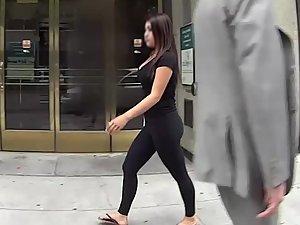 Curvy girl in all black and flip flops