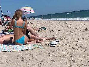 Petite girl in a very sexy pose on the beach Picture 4