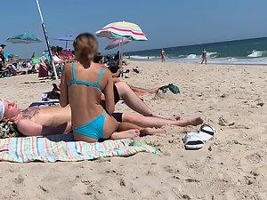 Petite girl in a very sexy pose on the beach Picture 5
