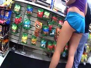 Teen girl with a nice butt picks candies Picture 2