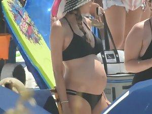 Sexy pregnant woman on the beach Picture 1