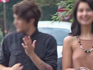 Perky tits of a hipster girl caught without a bra