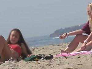 Hot teens play frisbee on the beach Picture 2