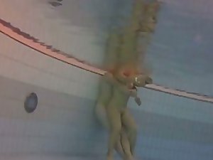 Couple trying to have sex in the pool