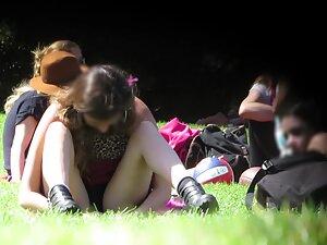 Hottie spreads legs when she sits on grass Picture 5