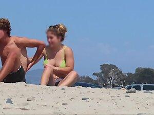 Peeping on strong but feminine girl at beach Picture 1