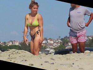 Peeping on strong but feminine girl at beach Picture 8