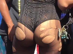 Party girl's sensational ass in torn pantyhose