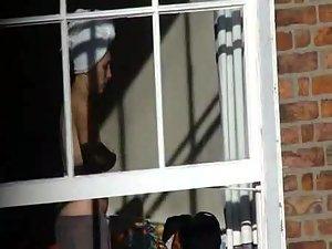 Voyeur peeps her tits through a window Picture 5