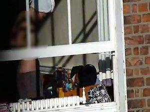 Voyeur peeps her tits through a window Picture 8