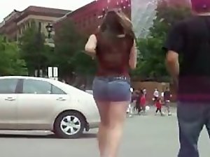 Cute woman in jeans shorts