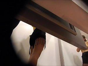 Spying on shaved pussy in the dressing room Picture 2