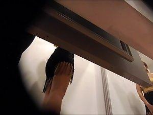 Spying on shaved pussy in the dressing room Picture 3