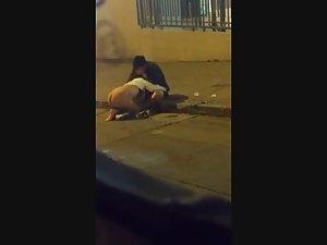 Kinky blowjob out on the street curb Picture 2