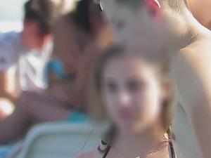 Slutty teen girl by the swimming pool Picture 5