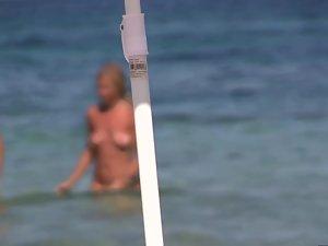 Milf of all milfs on the nudist beach Picture 1