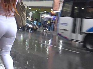 Phat booty in white pants caught on rainy day Picture 1